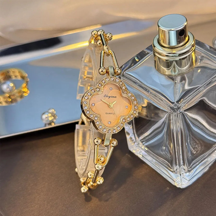 Lucky Four-Leaf Clover Design Watches for Women, Featuring Gold Chains and Gem - Studded Bezels