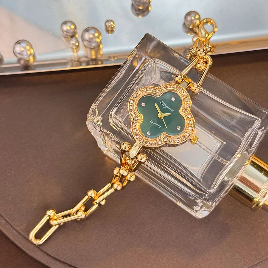 Lucky Four-Leaf Clover Design Watches for Women, Featuring Gold Chains and Gem - Studded Bezels