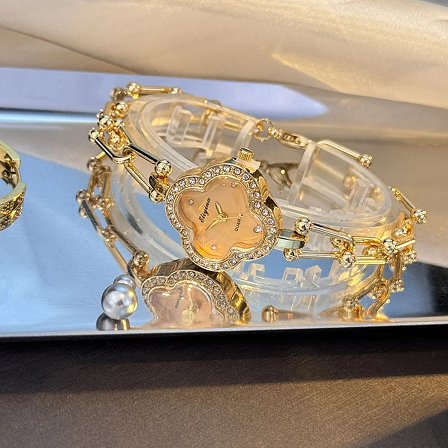 Lucky Four-Leaf Clover Design Watches for Women, Featuring Gold Chains and Gem - Studded Bezels