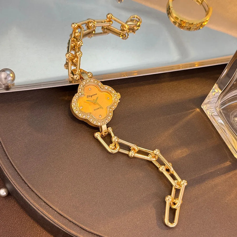 Lucky Four-Leaf Clover Design Watches for Women, Featuring Gold Chains and Gem - Studded Bezels