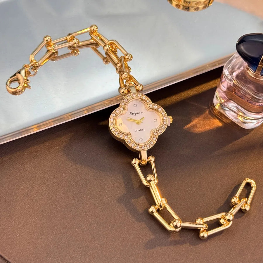 Lucky Four-Leaf Clover Design Watches for Women, Featuring Gold Chains and Gem - Studded Bezels