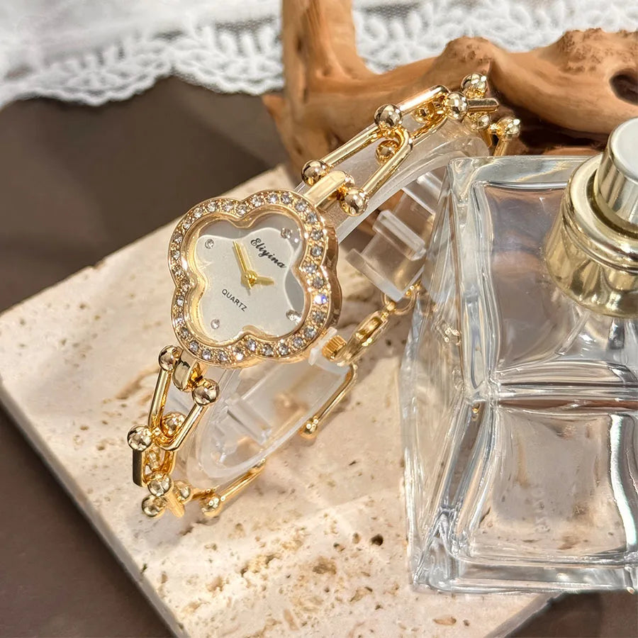 Lucky Four-Leaf Clover Design Watches for Women, Featuring Gold Chains and Gem - Studded Bezels