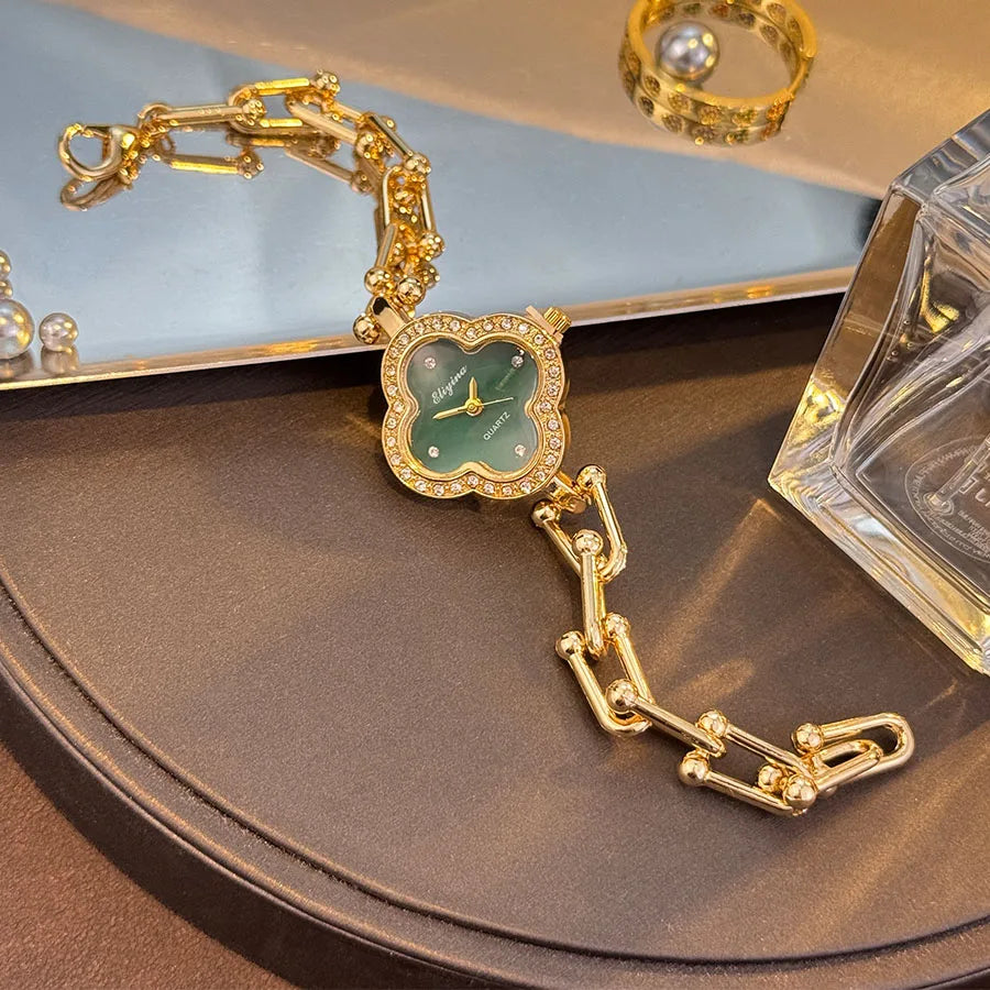 Lucky Four-Leaf Clover Design Watches for Women, Featuring Gold Chains and Gem - Studded Bezels