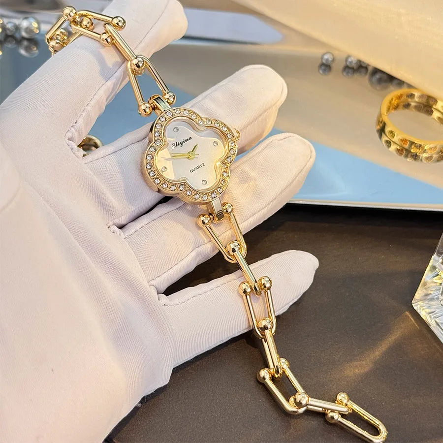 Lucky Four-Leaf Clover Design Watches for Women, Featuring Gold Chains and Gem - Studded Bezels