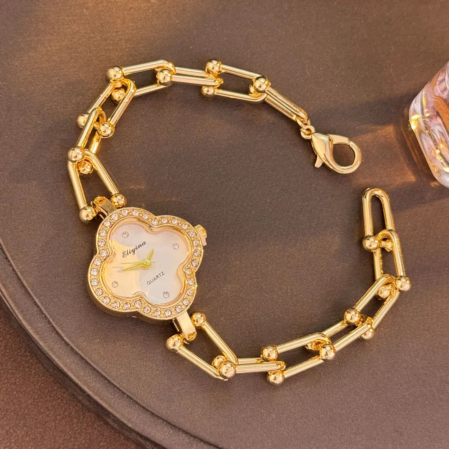 Lucky Four-Leaf Clover Design Watches for Women, Featuring Gold Chains and Gem - Studded Bezels