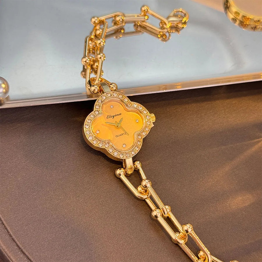 Lucky Four-Leaf Clover Design Watches for Women, Featuring Gold Chains and Gem - Studded Bezels
