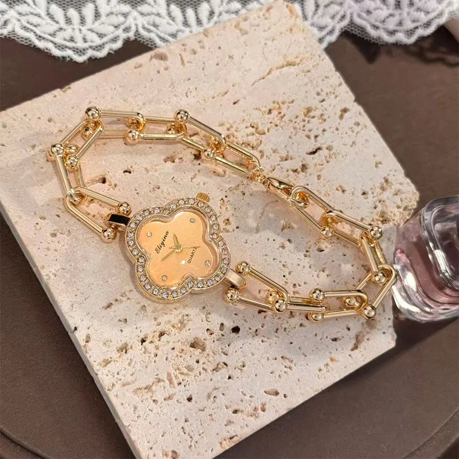Lucky Four-Leaf Clover Design Watches for Women, Featuring Gold Chains and Gem - Studded Bezels